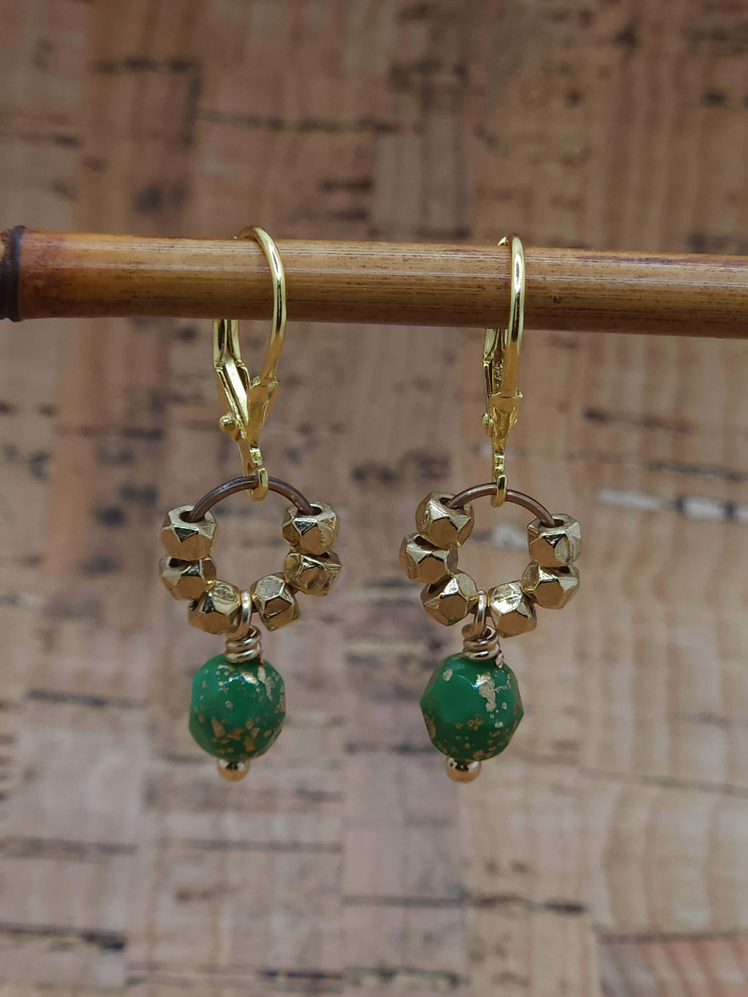 This close-up photo of the Rainbow Mountains Earrings highlights the petite design.